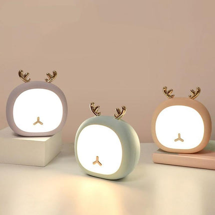 Luce notturna LED con gatto addormentato