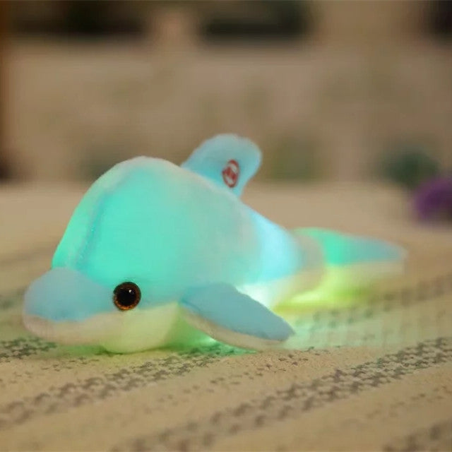 Cuscino peluche luminoso a forma delfino