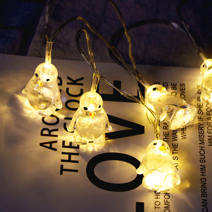 Catena luminosa LED a forma di pinguini