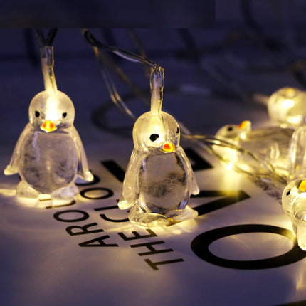 Catena luminosa LED a forma di pinguini