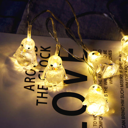 Catena luminosa LED a forma di pinguini