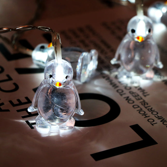 Catena luminosa LED a forma di pinguini