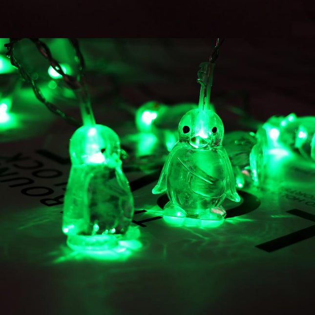 Catena luminosa LED a forma di pinguini