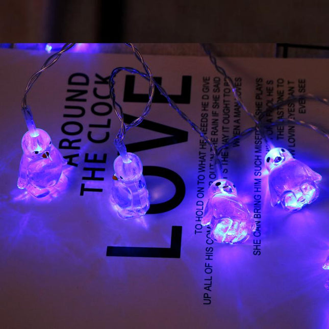 Catena luminosa LED a forma di pinguini