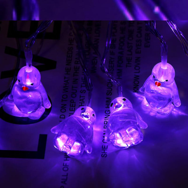 Catena luminosa LED a forma di pinguini