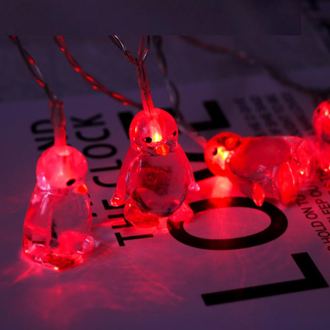 Catena luminosa LED a forma di pinguini