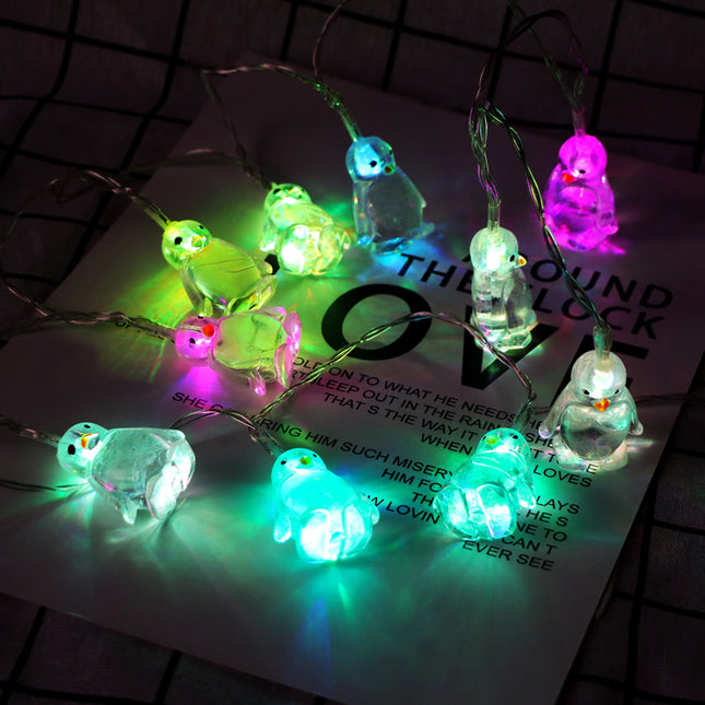 Catena luminosa LED a forma di pinguini