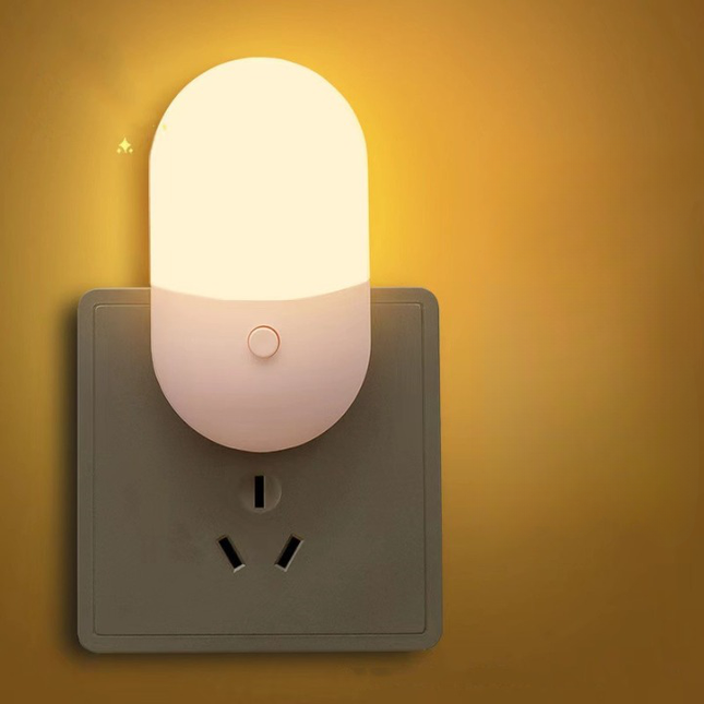 Luce notturna LED da presa bicolore