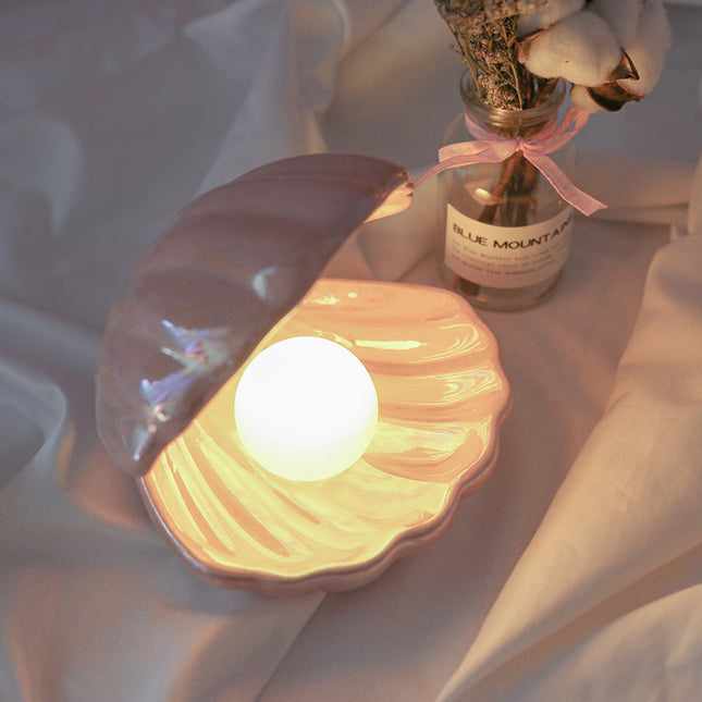 Luce notturna a forma di conchiglia