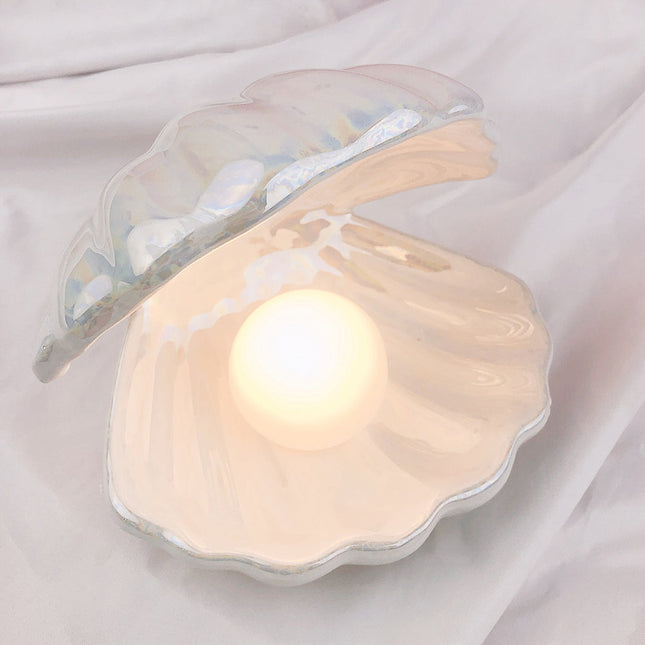 Luce notturna a forma di conchiglia