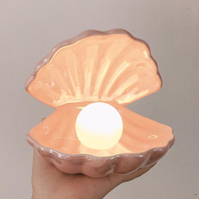 Luce notturna a forma di conchiglia