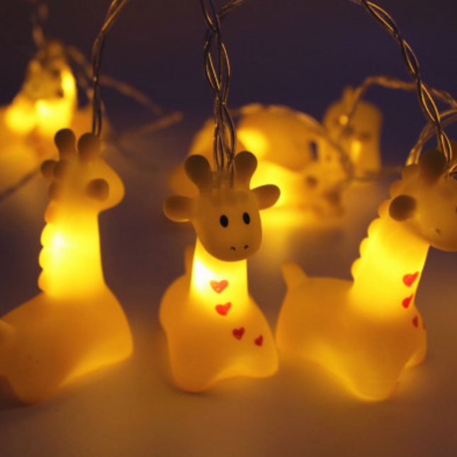 Ghirlanda luminosa LED con piccole giraffe