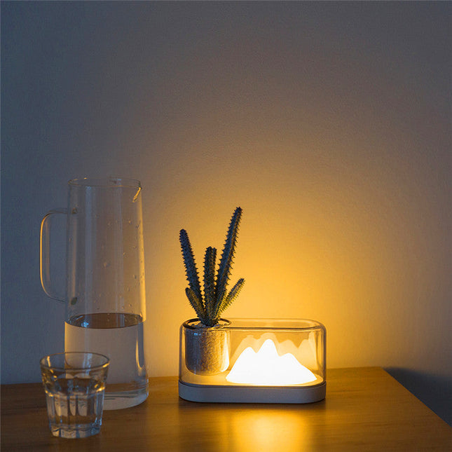 Lampada da tavolo LED design collina