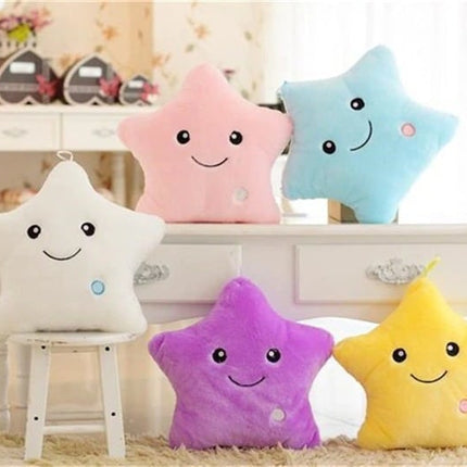 Cuscino peluche luminoso a stella rosa