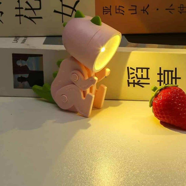 Mini lampada LED dinosauro da lettura